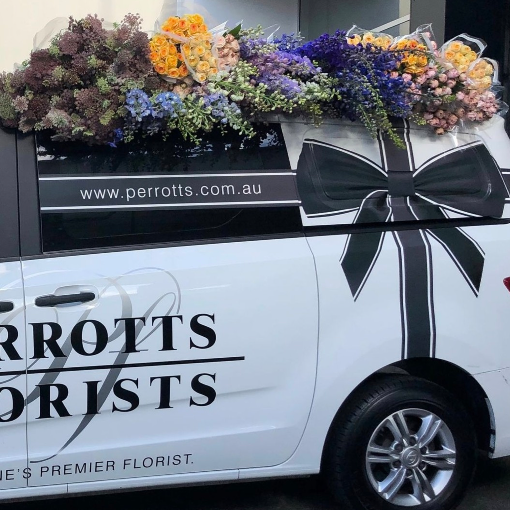 Delivery Van flowers on the roof